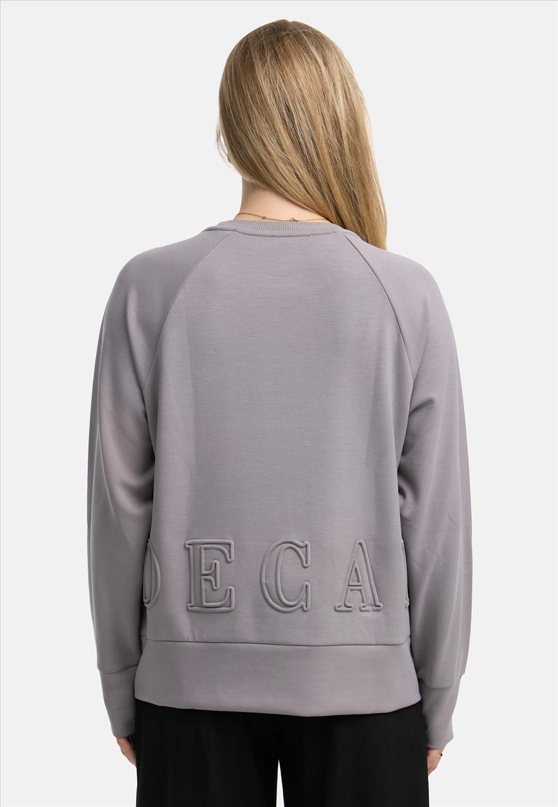 Decay Modevertrieb GmbH - Textilien Grosshandel T-Shirts Jeans