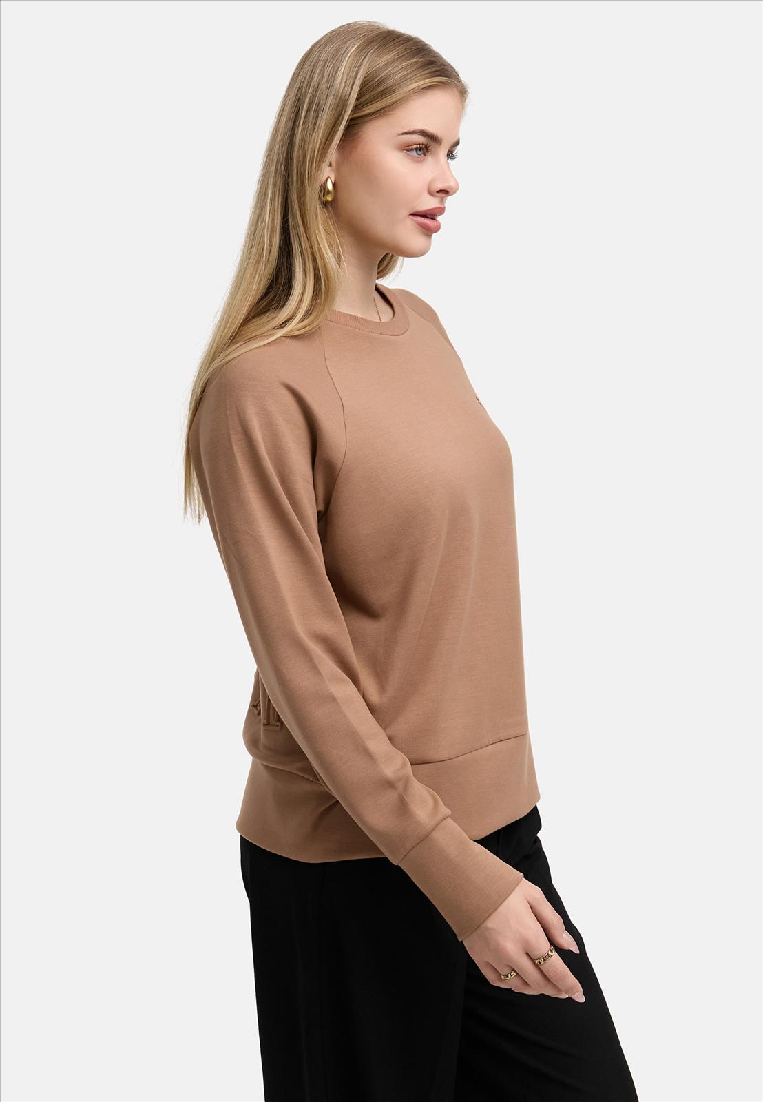 Decay Modevertrieb GmbH - Textilien Grosshandel T-Shirts Jeans